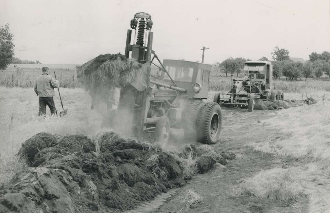 history of Iowa, Waverly Public Library, Waverly, IA, Iowa, Motorized Vehicles, correct date needed, Iowa History, driver, dirt, tree, Labor and Occupations