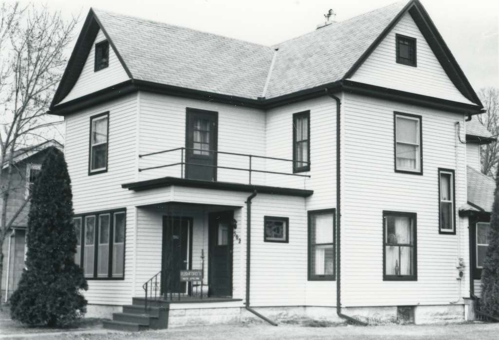 history of Iowa, Iowa History, front steps, wooden house, Iowa, tree, porch, Homes, deck, Waverly Public Library, railing