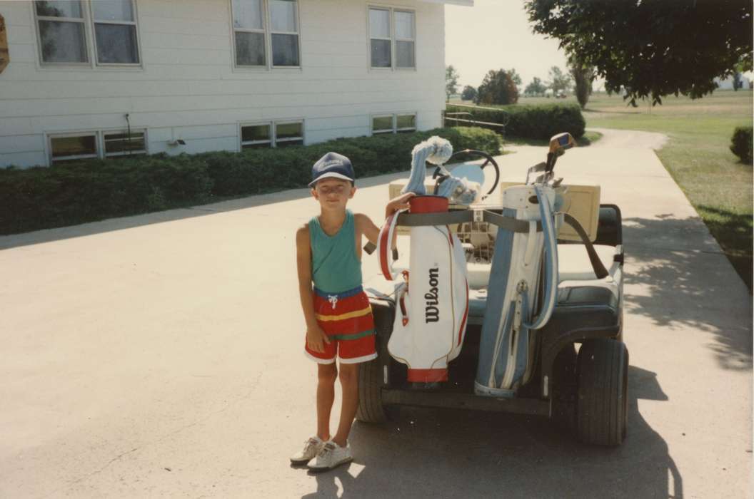 Bohach, Beverly, Thornton, IA, Portraits - Individual, Iowa History, colorized, Iowa, summer, Sports, Outdoor Recreation, golf, wilson, golf cart, Children, history of Iowa, golf clubs