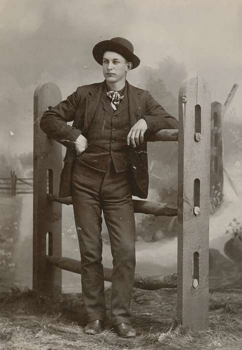 bow tie, history of Iowa, Iowa History, Olsson, Ann and Jons, man, cabinet photo, Iowa, fence, painted backdrop, State Center, IA, hat, Portraits - Individual