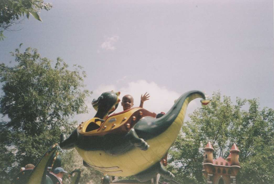 boy, Travel, hand, Altoona, IA, adventureland, Iowa, Barrett, Sarah, Fairs and Festivals, dragon, Children, african american, amusement ride, People of Color, history of Iowa, amusement park, Iowa History