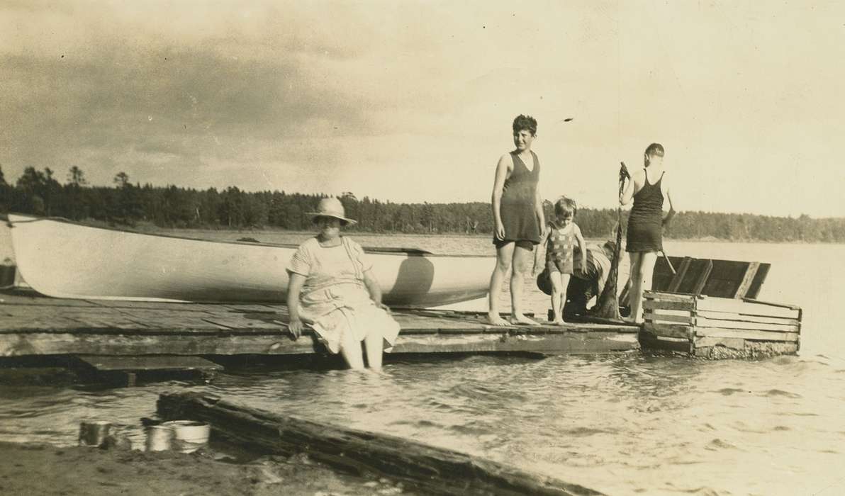 Outdoor Recreation, boy, woman, Conklin, Beverly, Children, Lakes, Rivers, and Streams, shore, lake, man, history of Iowa, Iowa History, Portraits - Group, vacation, Travel, Iowa, Families, boat, swimsuit, MN, forest, girl