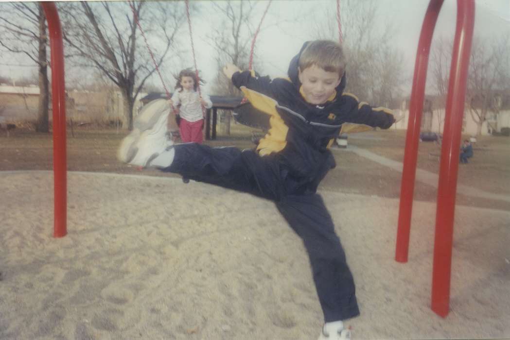 IA, history of Iowa, playground, coat, Scholtec, Emily, Iowa, sand, swing, park, Children, Iowa History, Leisure