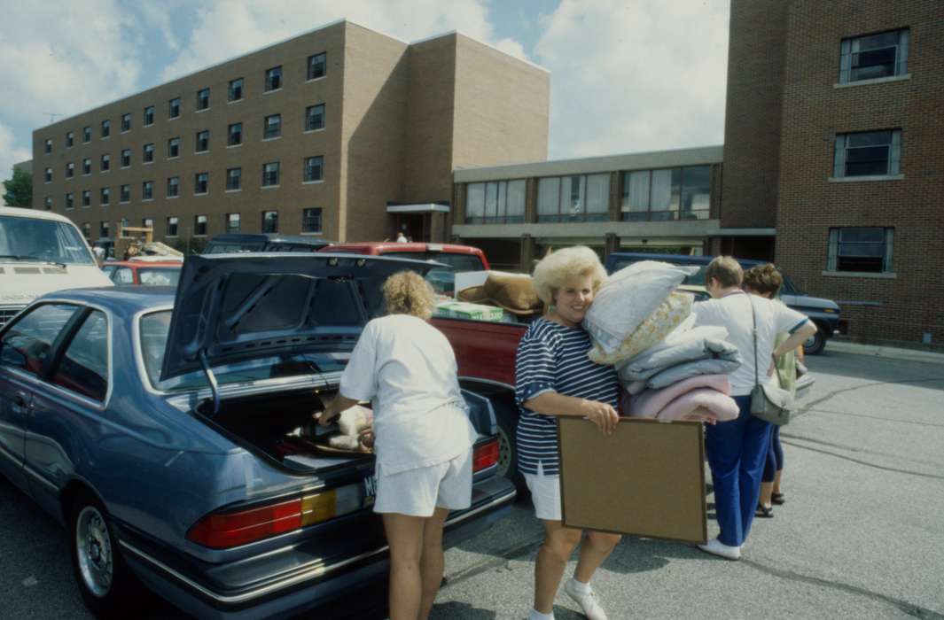 parking lot, Iowa, UNI Special Collections & University Archives, Schools and Education, Families, uni, dorm, university of northern iowa, car, Portraits - Individual, hagemann, dormitory, Cedar Falls, IA, pillow, history of Iowa, Motorized Vehicles, Iowa History