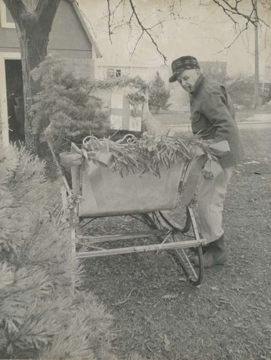 history of Iowa, man, Waverly Public Library, Waverly, IA, Holidays, Iowa, sleigh, Winter, christmas tree, Iowa History, barn, christmas