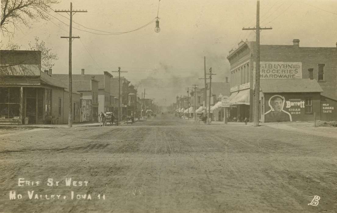 Palczewski, Catherine, street light, history of Iowa, Missouri Valley, IA, Main Streets & Town Squares, mud, Iowa, Cities and Towns, advertisement, Businesses and Factories, road, horse, Iowa History, general store, telephone pole