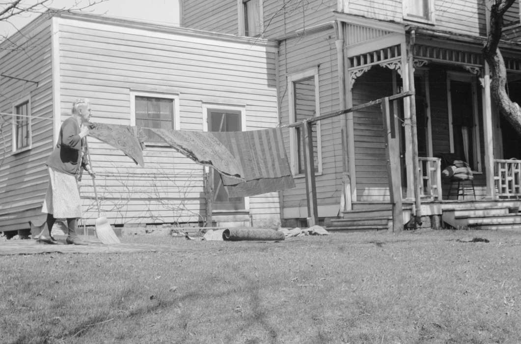 rug, broom, skirt, porch, Homes, Iowa History, architecture, Library of Congress, Iowa, clothesline, history of Iowa, laundry