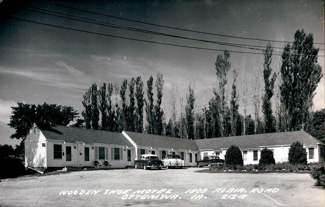 Businesses and Factories, back of car, bushes, Iowa History, tree line, Motorized Vehicles, Iowa, Lemberger, LeAnn, Ottumwa, IA, electric lines, motel, Leisure, history of Iowa