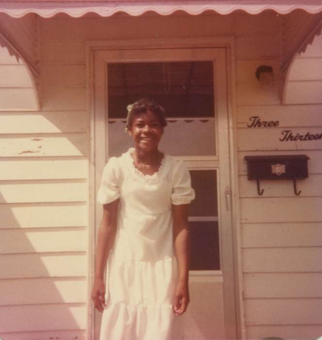 african american, People of Color, history of Iowa, Iowa History, Barrett, Sarah, girl, smile, mailbox, Iowa, Waterloo, IA, Homes, Children, Portraits - Individual
