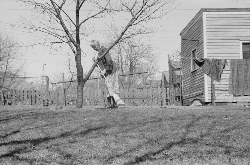 clothesline, Labor and Occupations, Homes, Library of Congress, history of Iowa, broom, Iowa, chores, cleaning, Iowa History, tree