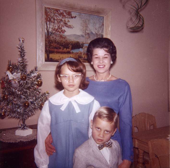 necklace, smile, Northwood, IA, Myli, Diane, Iowa History, Holidays, picture, Children, glasses, christmas tree, christmas, history of Iowa, Iowa, Portraits - Group, Homes, bow tie, Families