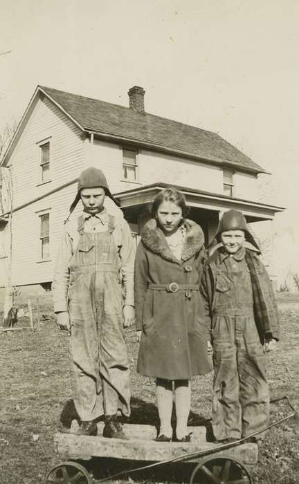 Portraits - Group, aviator hat, history of Iowa, fur, Hinton, IA, Iowa History, farmhouse, brothers, bomber cap, bomber hat, wagon, aviator, Iowa, house, Children, Berger, Cathy, sister