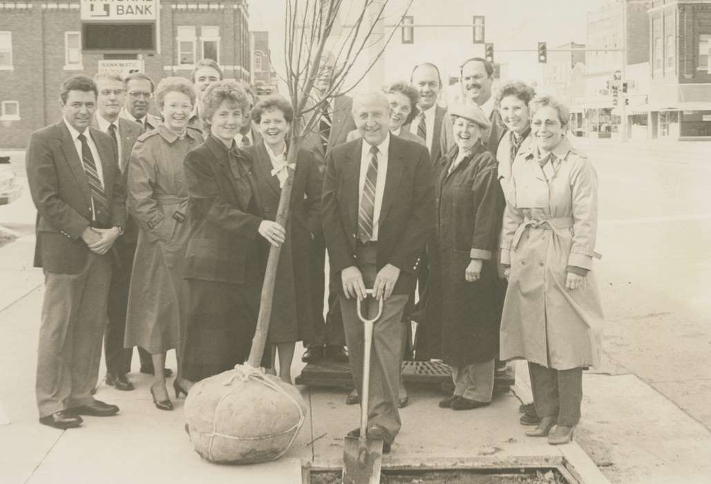 history of Iowa, smile, Waverly Public Library, Main Streets & Town Squares, Iowa, suit, mustache, Iowa History, glasses, correct date needed, stoplight, Cities and Towns, coat, shovel, Portraits - Group, Waverly, IA, trenchcoat, Civic Engagement, tie, tree