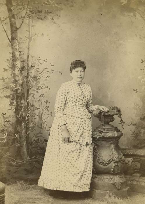 Iowa History, dress, woman, Iowa, history of Iowa, frizzy bangs, Portraits - Individual, Storm Lake, IA, painted backdrop, flower, cabinet photo, Olsson, Ann and Jons