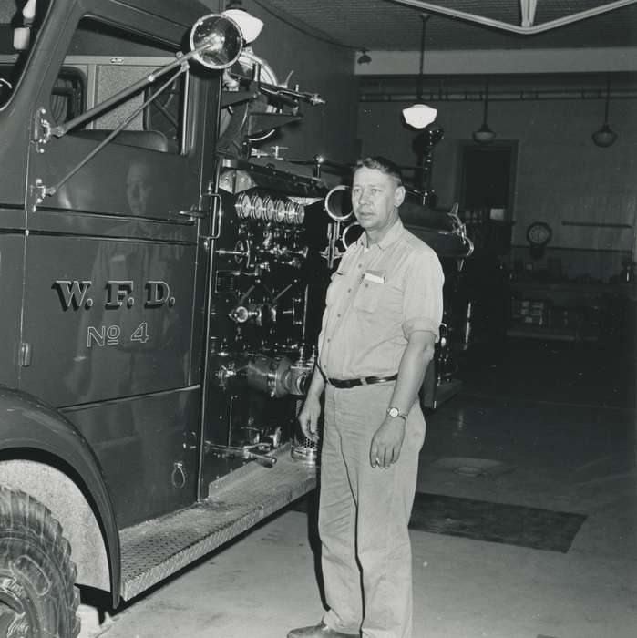 history of Iowa, Iowa History, light, Motorized Vehicles, Businesses and Factories, garage, Waverly, IA, fire truck, cigarette, man, watch, Iowa, Labor and Occupations, correct date needed, fire station, Waverly Public Library, fire engine, Portraits - Individual