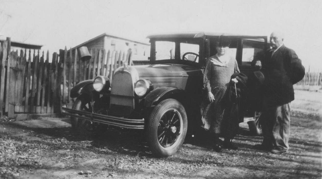 Portraits - Group, Iowa, woman, shed, Zieser, Stan, hat, Iowa History, bucket, car, history of Iowa, fence, man, Clive, IA, Motorized Vehicles, chrysler, automobile