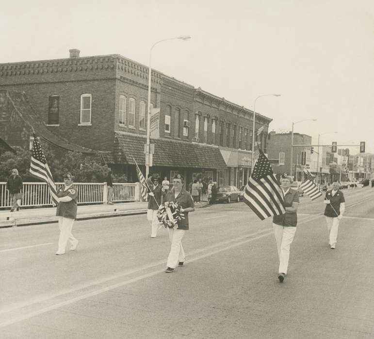 Military and Veterans, Main Streets & Town Squares, holiday, bridge, uniform, Iowa History, parade, history of Iowa, woman, brick building, american flag, Waverly, IA, Iowa, Waverly Public Library, wreath