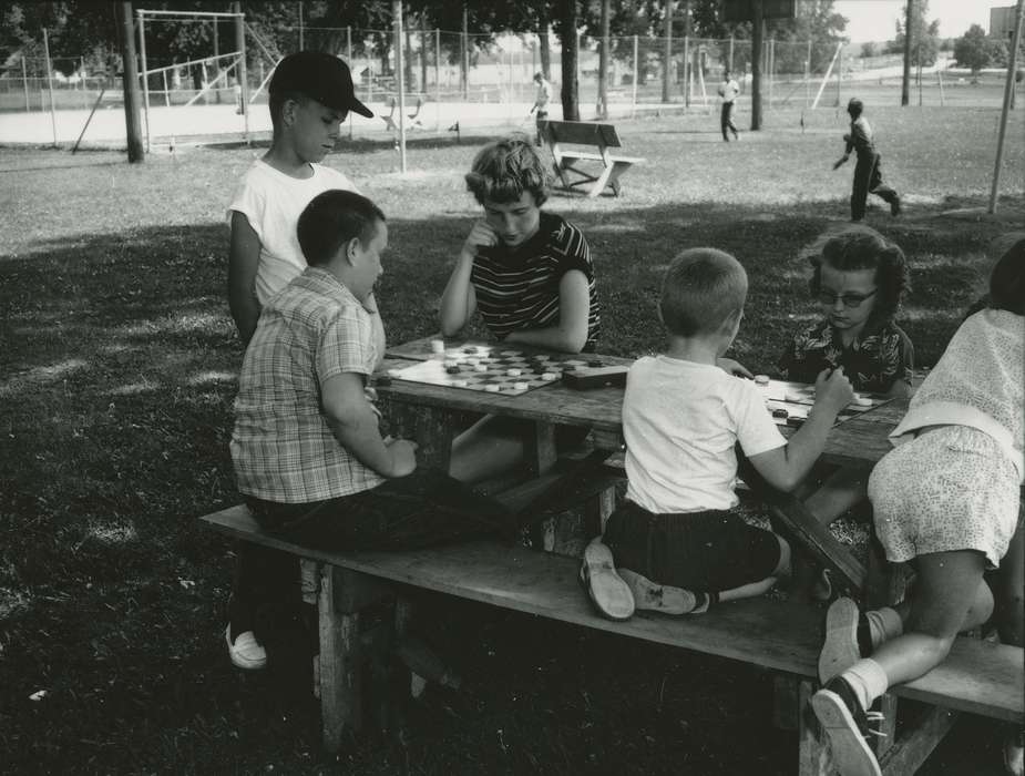 Waverly Public Library, checkers, history of Iowa, Iowa History, picnic table, baseball cap, glasses, Iowa, fence, picnic bench, Children, Leisure, park