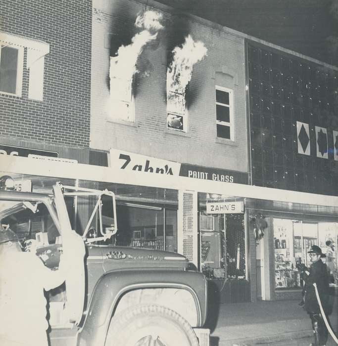 Main Streets & Town Squares, history of Iowa, Iowa History, Wrecks, Businesses and Factories, window, store, brick building, fire, business, building, Waverly, IA, Iowa, Cities and Towns, firefighter, Waverly Public Library, hose