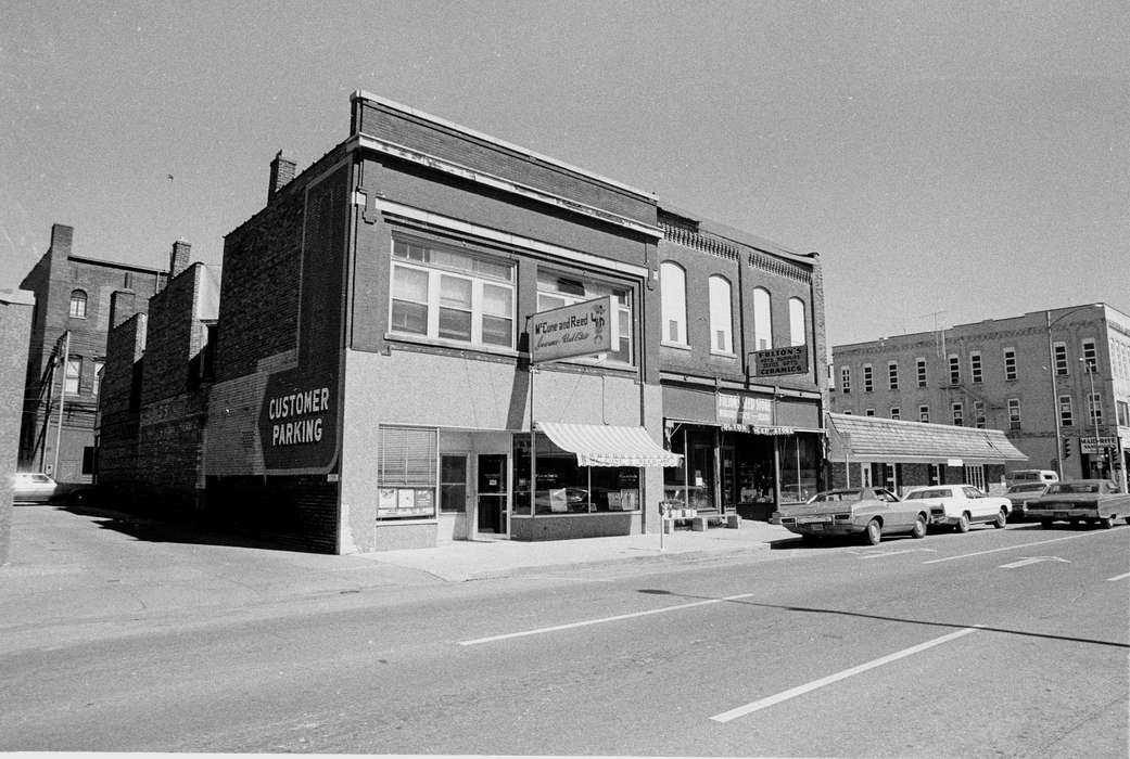 history of Iowa, Iowa History, Ottumwa, IA, Lemberger, LeAnn, storefront, Motorized Vehicles, Businesses and Factories, downtown, car, Iowa, Cities and Towns, street