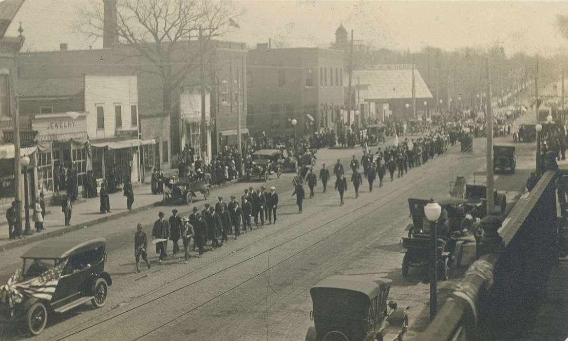 history of Iowa, Military and Veterans, Businesses and Factories, military parade, Waverly, IA, Main Streets & Town Squares, Iowa, Civic Engagement, Motorized Vehicles, main street, Families, Waverly Public Library, Iowa History, military, trucks, Cities and Towns