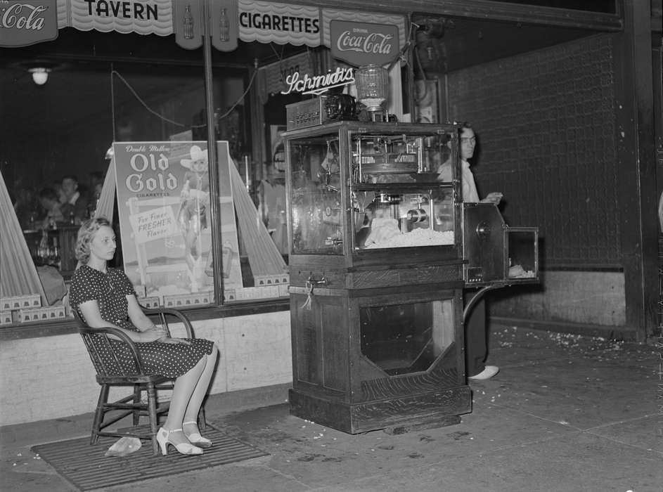 popcorn, Main Streets & Town Squares, history of Iowa, young woman, concession stand, Entertainment, Library of Congress, Iowa History, Businesses and Factories, Iowa, Cities and Towns, Food and Meals, tavern, Leisure, Labor and Occupations