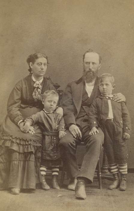 Portraits - Group, Families, siblings, man, mustache, carte de visite, brother, frock coat, brooch, sack coat, history of Iowa, Iowa History, beard, children, ribbon, woman, knickers, Washington, IA, family, Iowa, Olsson, Ann and Jons, Children