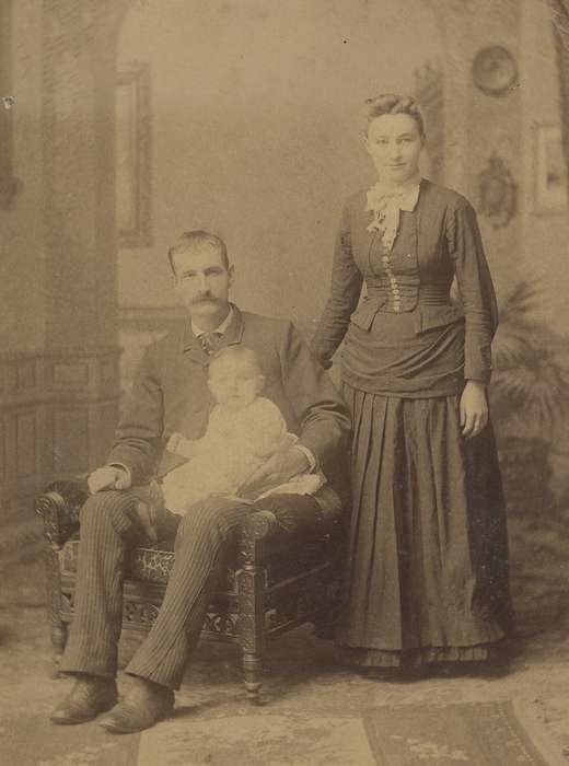 Children, history of Iowa, woman, Iowa, family, painted backdrop, patterned carpet, Families, mustache, bishop sleeves, cabinet photo, Iowa History, baby, Portraits - Group, man, Iowa City, IA, ruffles, Olsson, Ann and Jons, sack coat