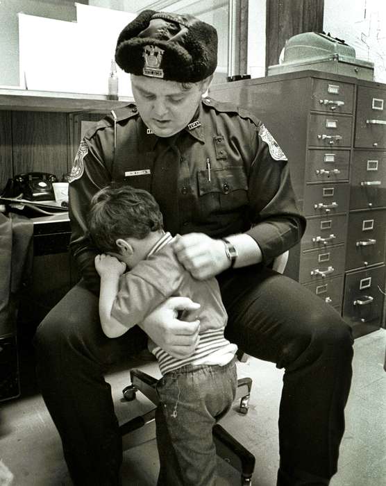 police, file cabinet, Iowa History, officer, Ottumwa, IA, history of Iowa, Prisons and Criminal Justice, Iowa, watch, Lemberger, LeAnn, crying, Children, hat