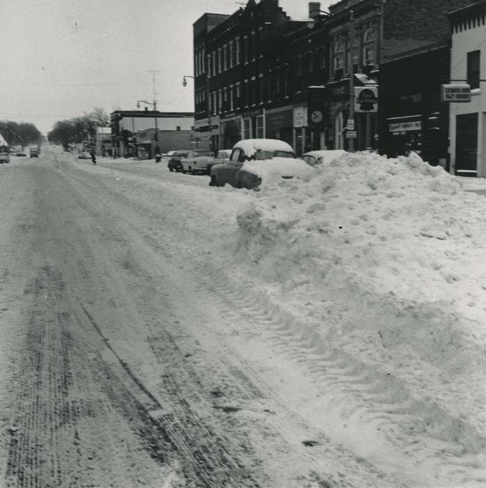 Main Streets & Town Squares, streetlights, history of Iowa, Iowa History, street sign, Winter, Motorized Vehicles, brick building, clock, car, Waverly, IA, sign, Iowa, correct date needed, snow, Waverly Public Library
