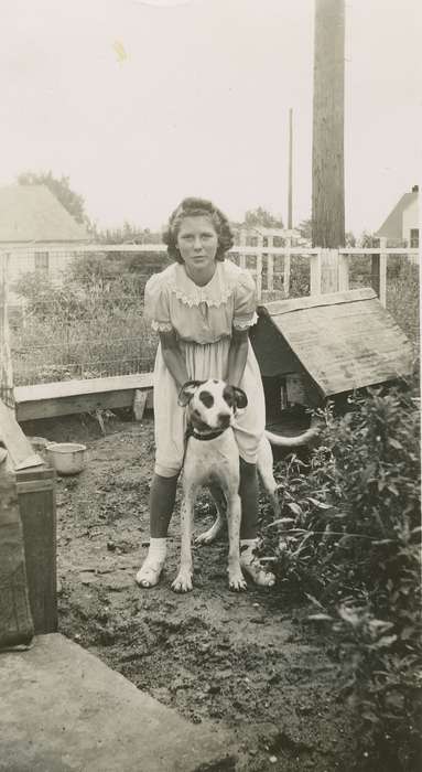 mud, dress, Iowa History, Children, Iowa, yard, history of Iowa, Portraits - Individual, Animals, Homes, curly hair, dog, Wilson, Dorothy, USA, dog house