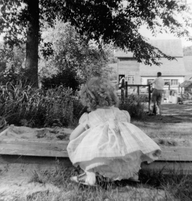 Outdoor Recreation, Shaw, Marilyn, Iowa, Hopkinton, IA, Children, sandbox, dress, girl, history of Iowa, Iowa History