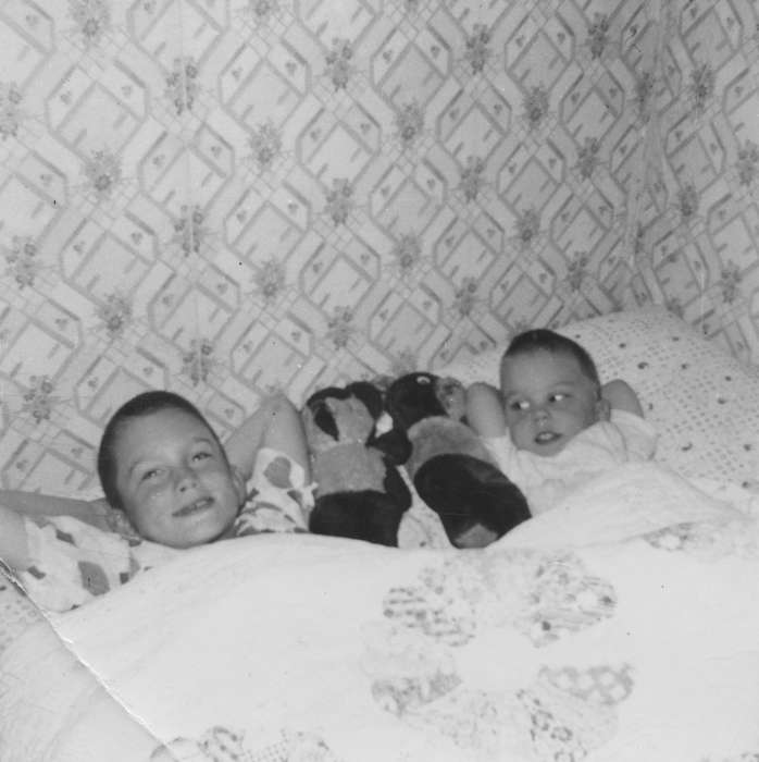Portraits - Group, Boone, IA, bedroom, Iowa History, history of Iowa, stuffed animal, sick, bed, Nervig, Gary, wallpaper, Iowa, Homes, Children
