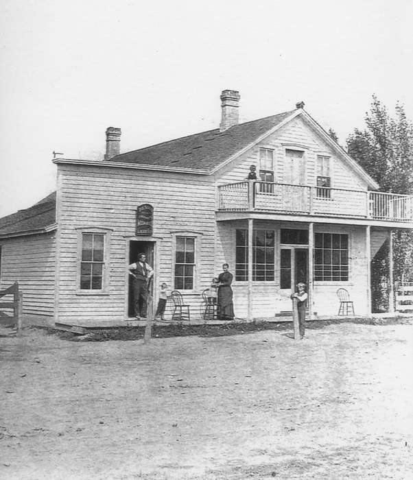 Portraits - Group, Mona, IA, Horgen, Susan, house, balcony, Iowa History, history of Iowa, store, chairs, Iowa, dirt road, Homes