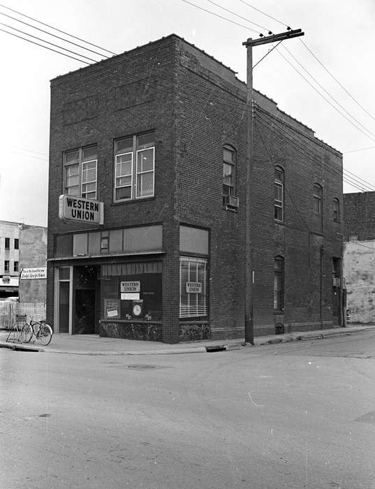 Businesses and Factories, air conditioner, store front, storefront, Cities and Towns, Iowa History, Iowa, bicycle, Lemberger, LeAnn, Ottumwa, IA, history of Iowa, clock, western union