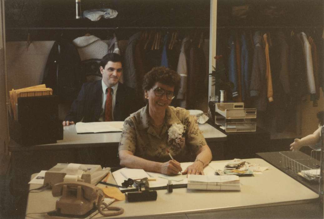 telephone, history of Iowa, Iowa History, Businesses and Factories, glasses, office, Iowa, desk, Clinton, IA, Mueller, Irma, Labor and Occupations, suit, Portraits - Individual
