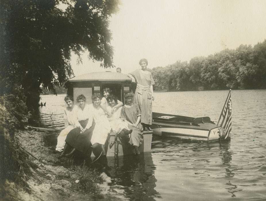 Portraits - Group, flag, history of Iowa, Iowa History, IA, Lakes, Rivers, and Streams, Iowa, LeQuatte, Sue, boat, Leisure