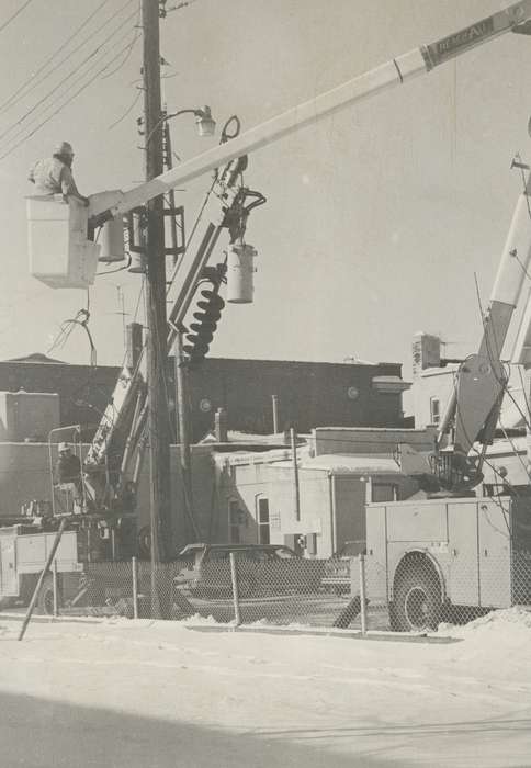 pole, worker, history of Iowa, Iowa History, Motorized Vehicles, truck, car, Waverly, IA, electric, Iowa, electrical line, Waverly Public Library, Labor and Occupations