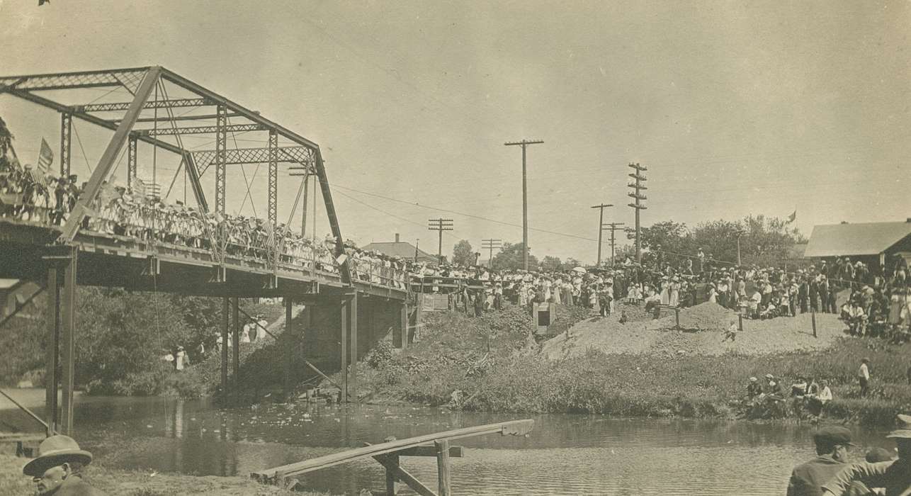 Cities and Towns, Iowa History, Eldora, IA, Iowa, history of Iowa, Palczewski, Catherine, bridge, flag, wagon
