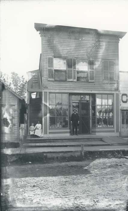 Iowa, Waverly Public Library, storefront, small business, store, business owner, Portraits - Individual, Cities and Towns, Businesses and Factories, history of Iowa, Waverly, IA, Main Streets & Town Squares, Iowa History