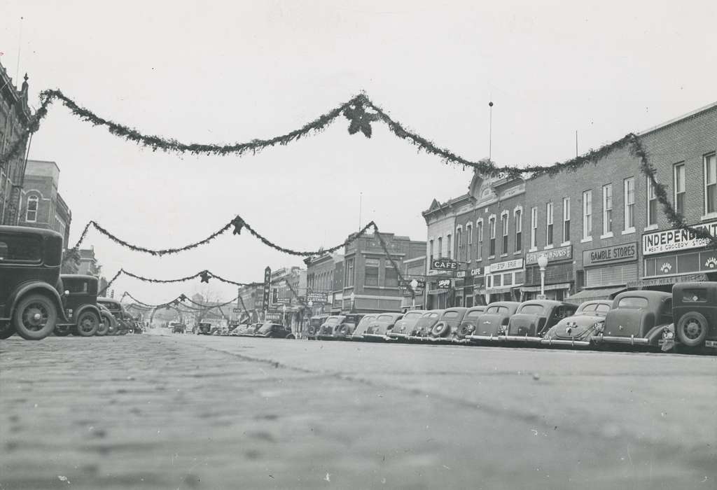 Cities and Towns, street parking, Iowa, Waverly Public Library, cars, downtown, Main Streets & Town Squares, correct date needed, snake eyes view, shops, history of Iowa, Businesses and Factories, celebration, Iowa History, Motorized Vehicles, parking, Waverly, IA, christmas decorations, Holidays, Winter