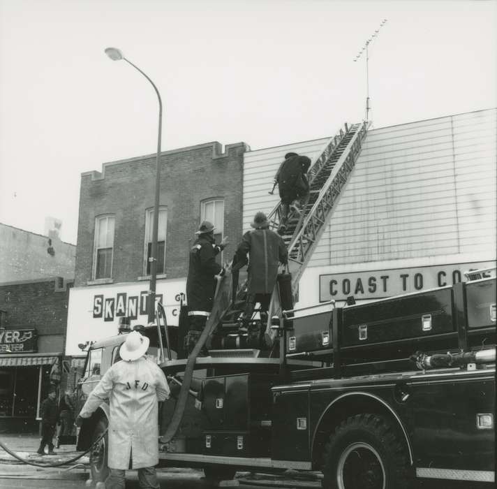 gift shop, history of Iowa, fire truck, fireman, hardware store, Businesses and Factories, Waverly, IA, Waverly Public Library, Main Streets & Town Squares, Iowa, ladder, Motorized Vehicles, Iowa History, Cities and Towns, Labor and Occupations, Wrecks