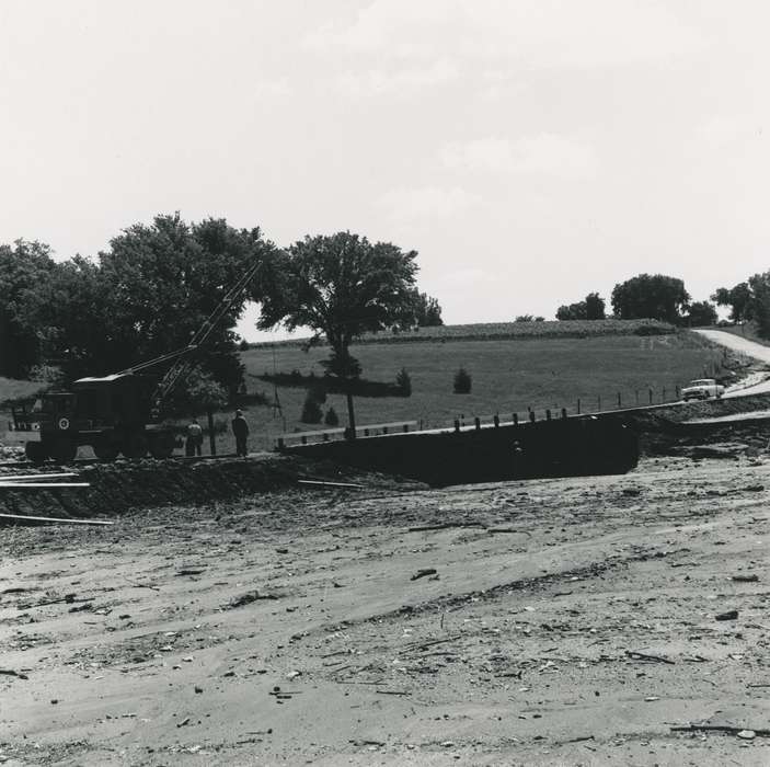 heavy machinery, worker, Floods, bridge, Iowa History, history of Iowa, road, car, flood aftermath, Waverly, IA, Iowa, tree, Waverly Public Library, Labor and Occupations