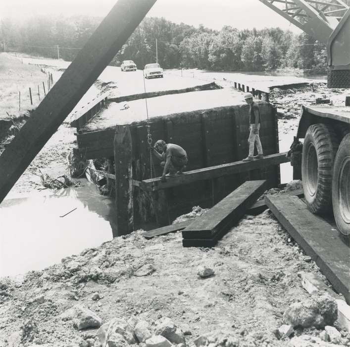 heavy machinery, worker, Floods, bridge, Iowa History, history of Iowa, Motorized Vehicles, road, wood, hard hat, flood aftermath, Waverly, IA, rock, Iowa, dirt, Waverly Public Library, Labor and Occupations