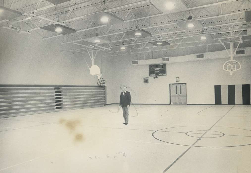 basketball court, history of Iowa, scoreboard, man, Waverly Public Library, basketball hoop, Iowa, gym, Bremer County, IA, Schools and Education, junior high, Iowa History, building interior, gymnasium