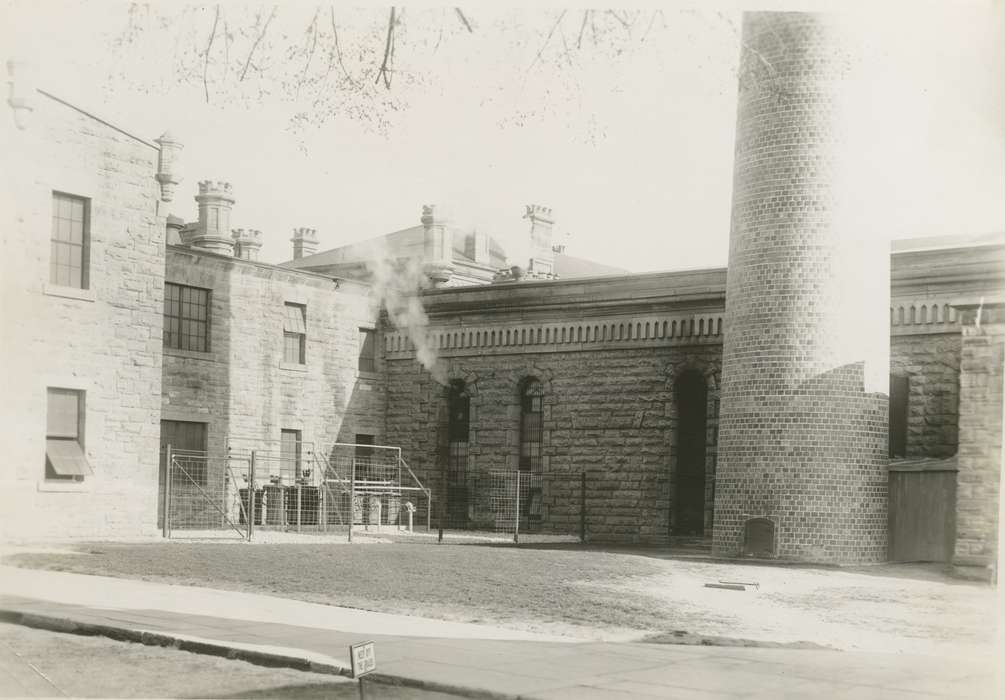 stone building, history of Iowa, Iowa History, anamosa state penitentiary, Prisons and Criminal Justice, Anamosa State Penitentiary Museum, smokestack, Iowa, fence, Anamosa, IA