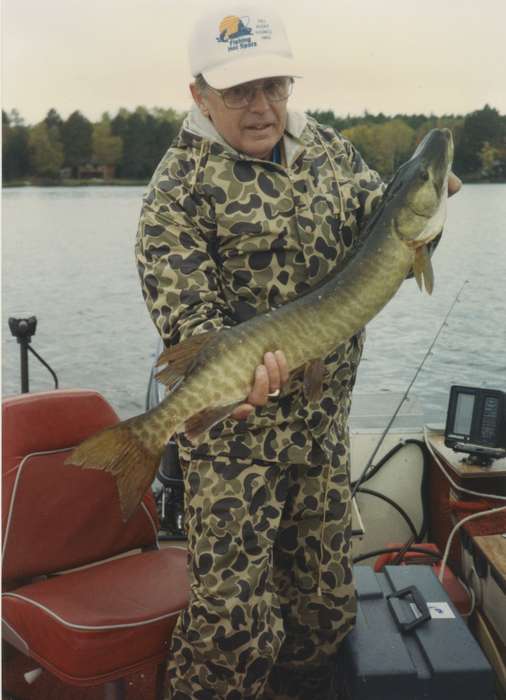musky, history of Iowa, camouflage, Iowa History, fishing pole, Olsson, Ann and Jons, Lakes, Rivers, and Streams, fish, fishing, muskellunge, Iowa, Outdoor Recreation, boat, Waterloo, WI, Leisure, Portraits - Individual