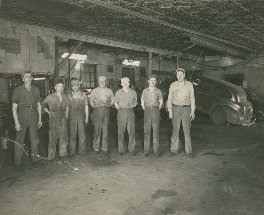 Portraits - Group, auto shop, Allison, IA, history of Iowa, uniform, Iowa History, Businesses and Factories, car, overalls, Iowa, Morris, Lola, mechanic, Labor and Occupations