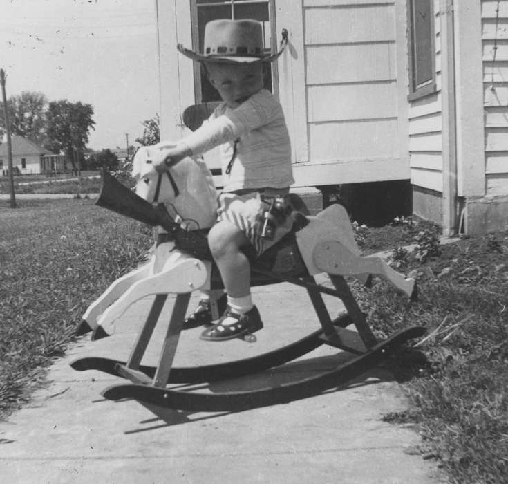 cowboy, history of Iowa, Iowa History, IA, rifle, rocking horse, cowboy hat, gun, Schrodt, Evelyn, Iowa, Children, Leisure