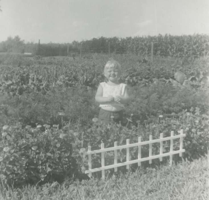 Leisure, Portraits - Individual, Iowa History, Iowa, garden, fence, Farms, history of Iowa, smile, Bartlett, Elizabeth, flower, Children, Hudson, IA